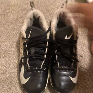 Size 8.5 black football cleats